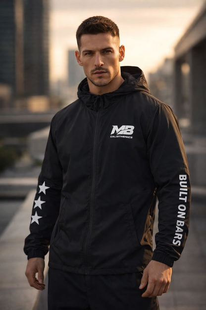 MotionBar calisthenics athlete training outdoors at sunset