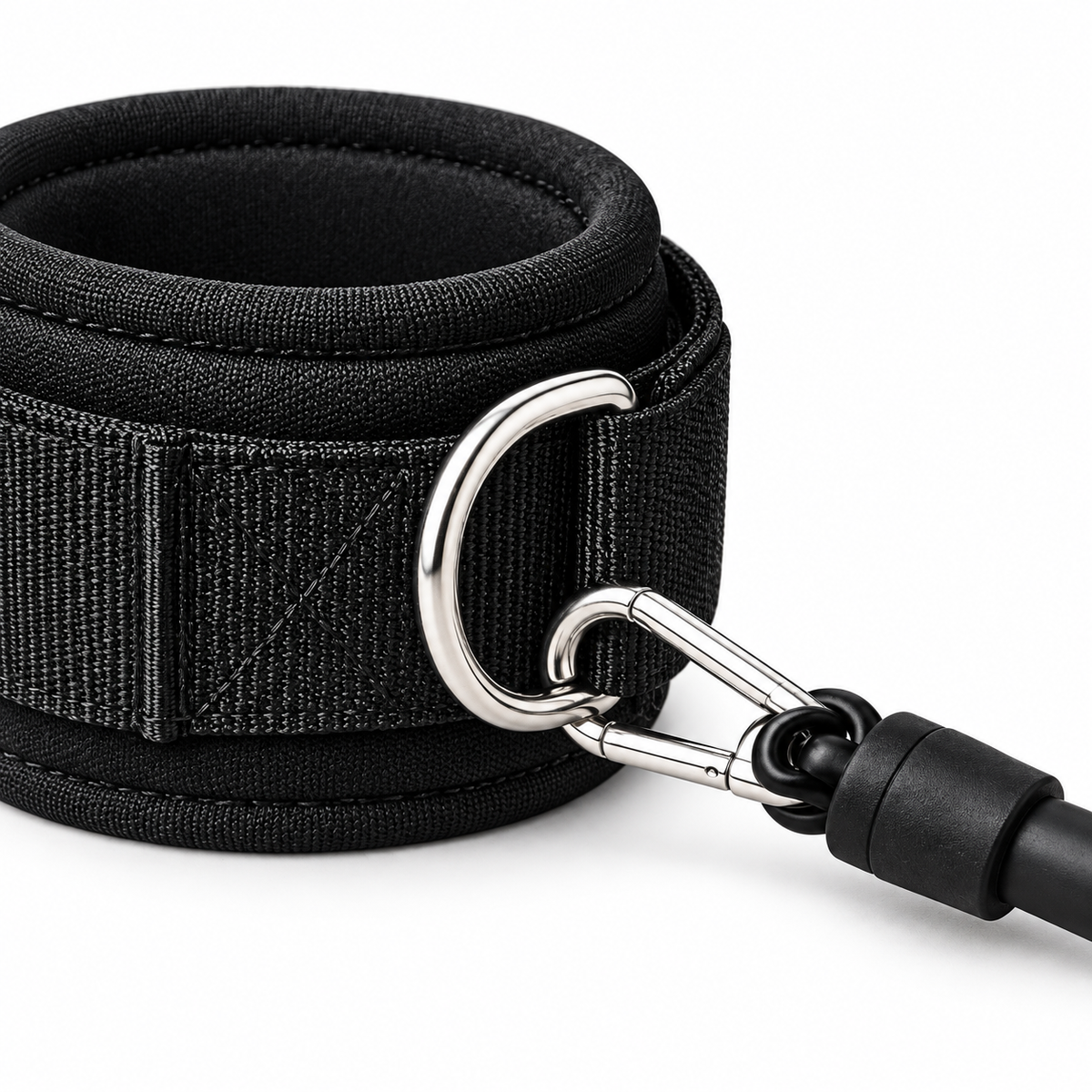 Close-up of MotionBar ankle cuff and resistance band attachment on white background